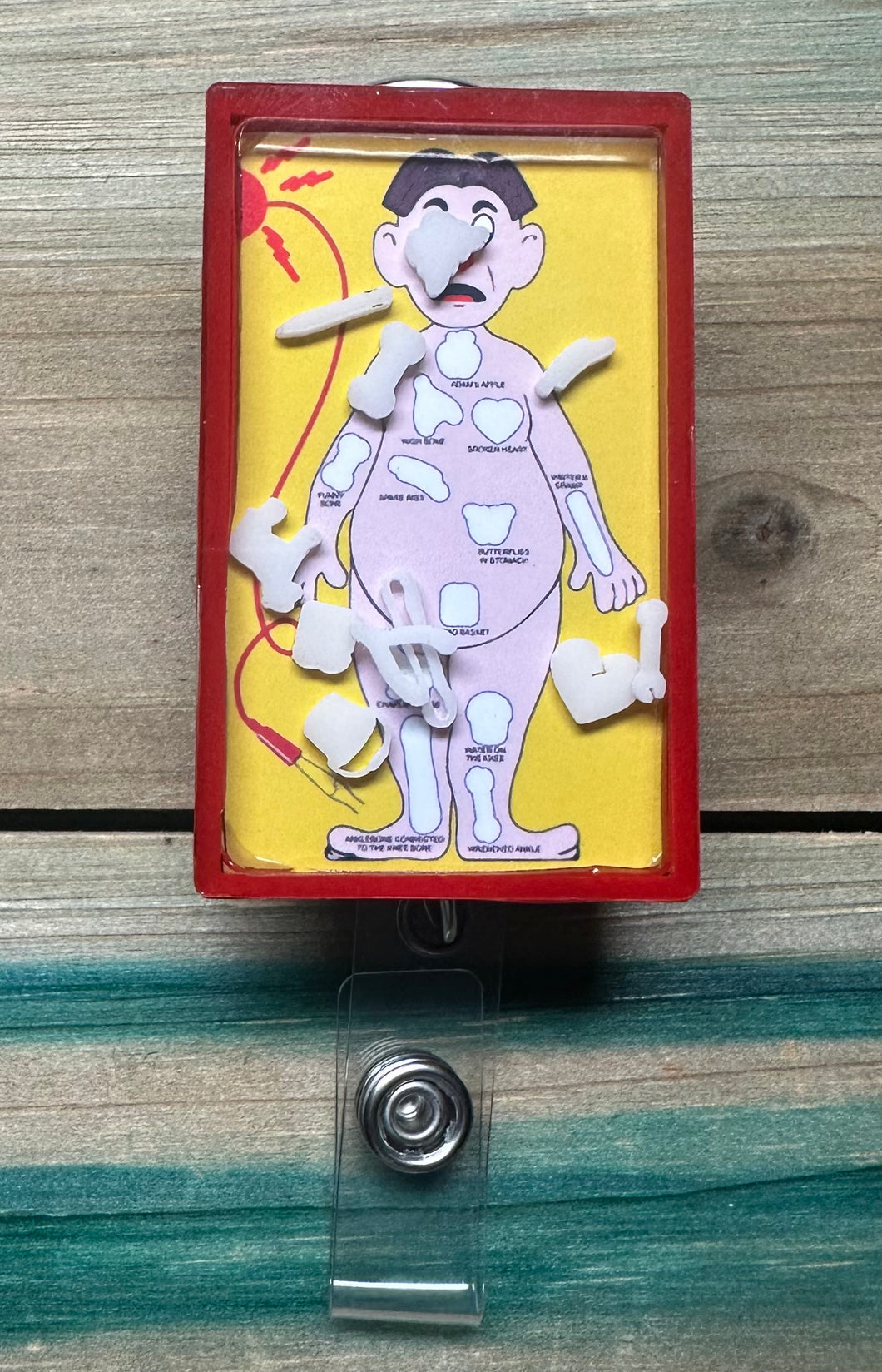 Operation Man Shaker Badge Reel